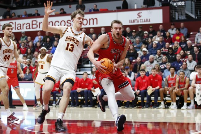 Men's Basketball player Mitchell Saxen drives against Santa Clara in January 2025