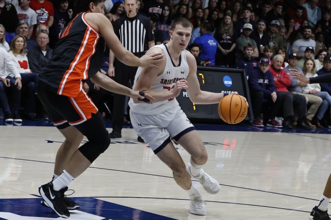 Men's basketball player Paulius Marauskas drives against OSU on March 1 2025