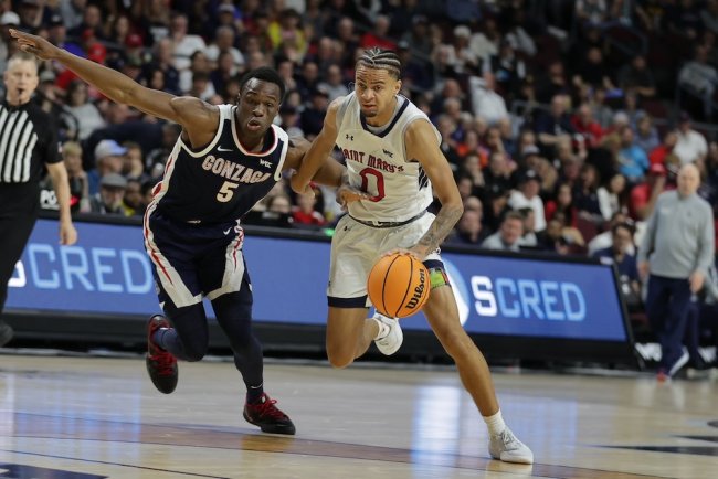 Men's Basketball player Mikey Lewis drives against Gonzaga in 2025 WCC Tournament Finals