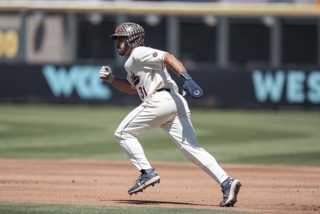 Baseball player Aiden Taurek runs against USF in WCC Tournament May 2025