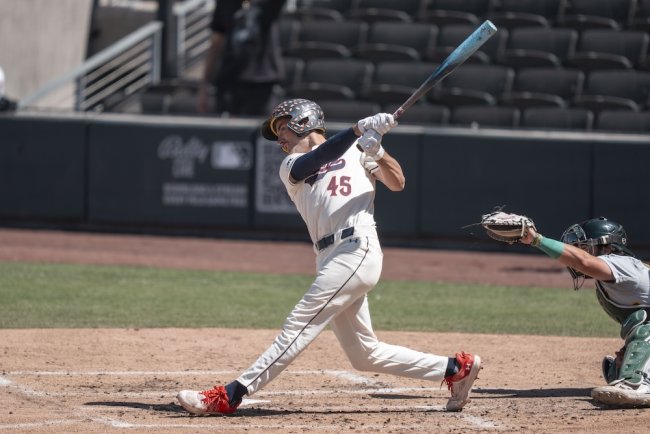 Baseball player Jared Mettam hits against USF in WCC Tournament May 2025