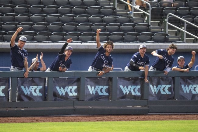 Gaels baseball team cheers in the dugout at WCC Tournament 2025 against Gonzaga