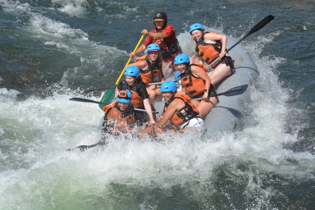 Calvin Barbounis ‘26, Kathrym Mauck ‘27, Ellie Keating ‘27, Savannah Peden ‘26 Cassandra Hernandez ‘27, and Ojal Dhar ‘26 are all smiles while bracing themselves for the next rapid.