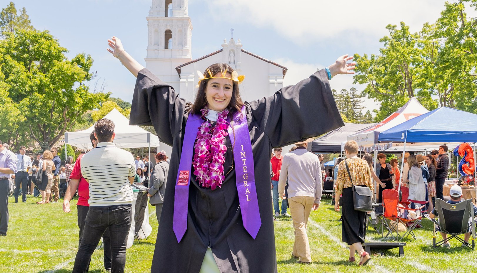 Grad with arms wide open