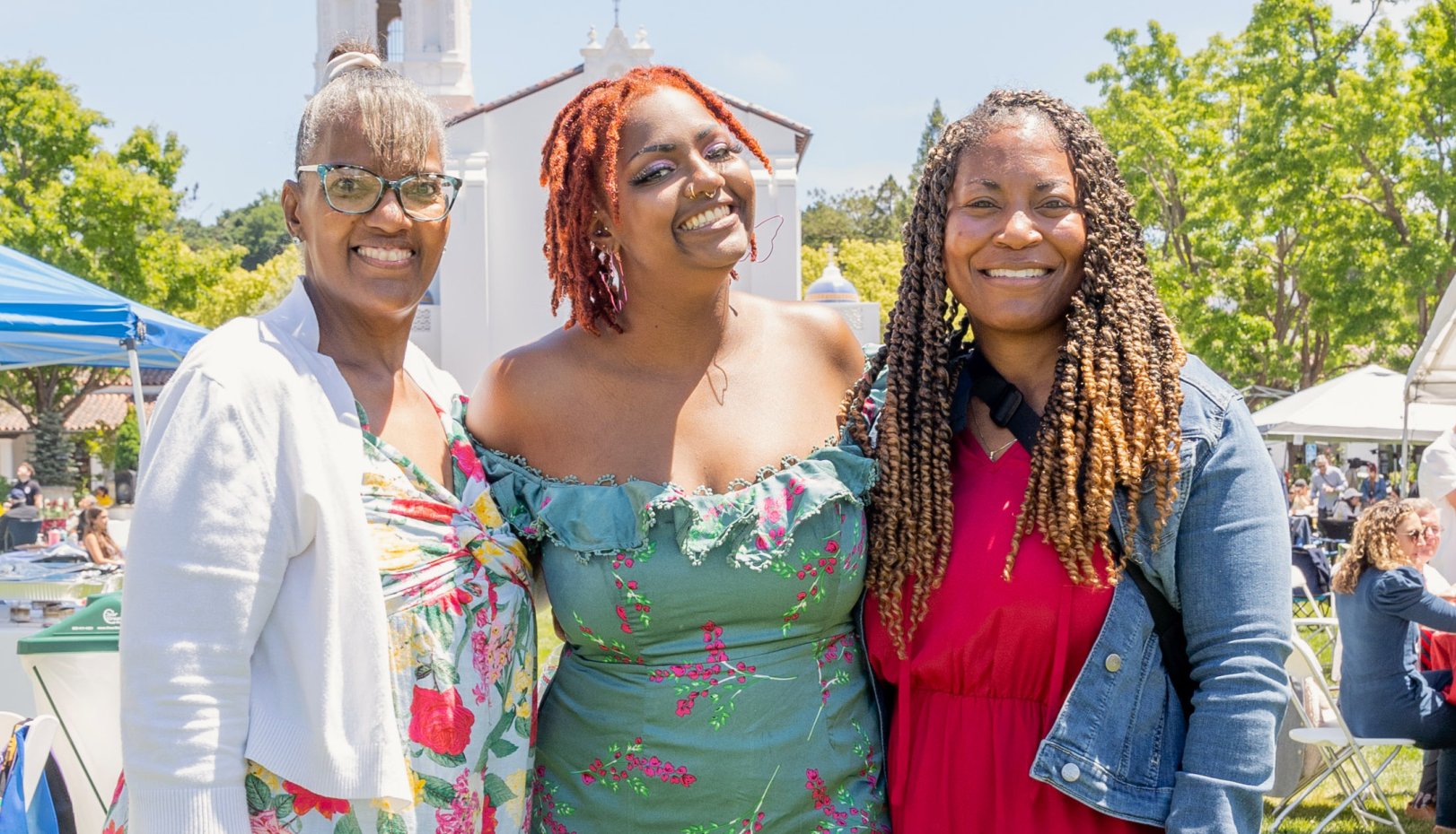 Grads smiling at Grad Grounds