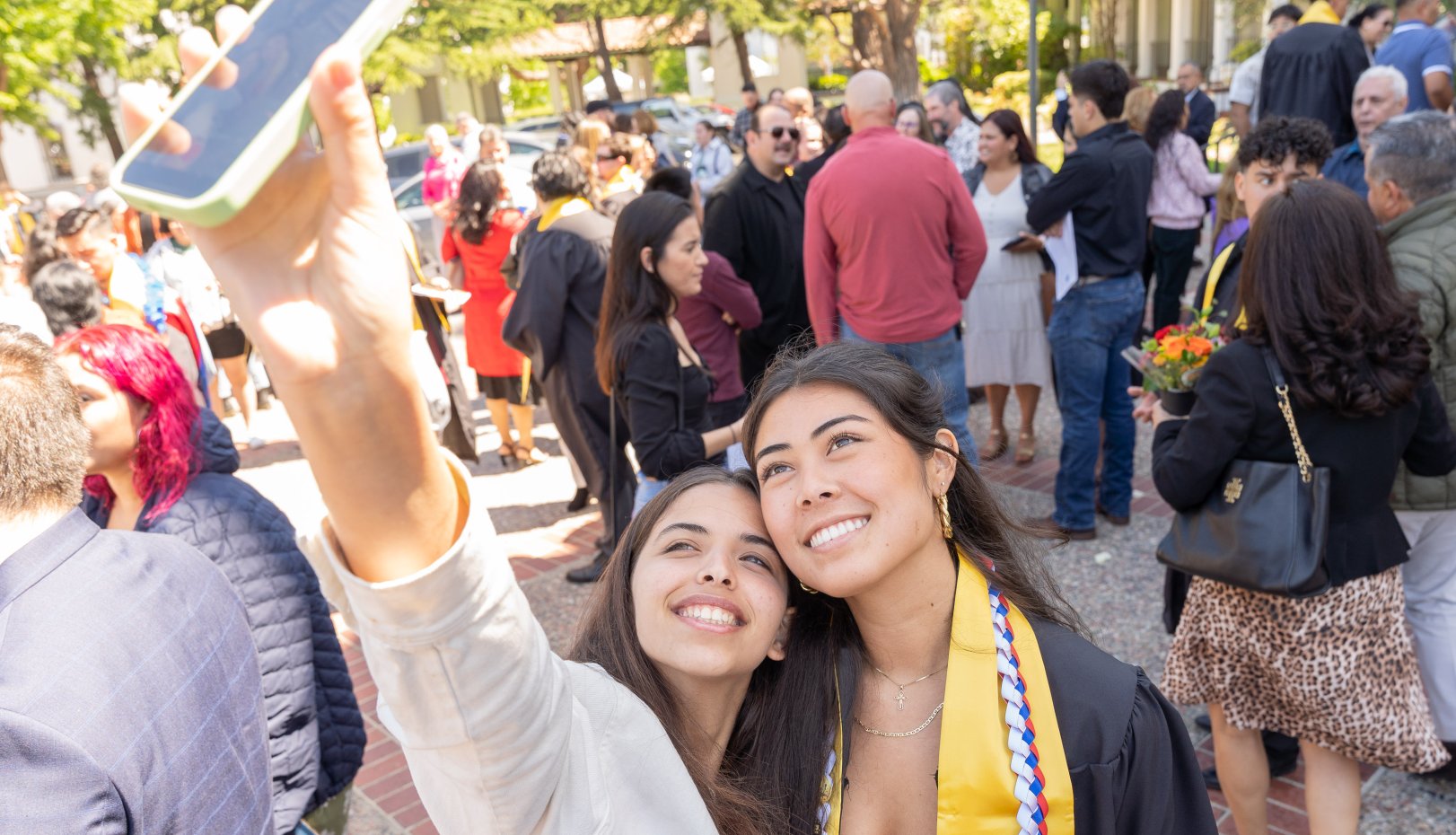Pair of Latinas at Latinx Grad Celebration