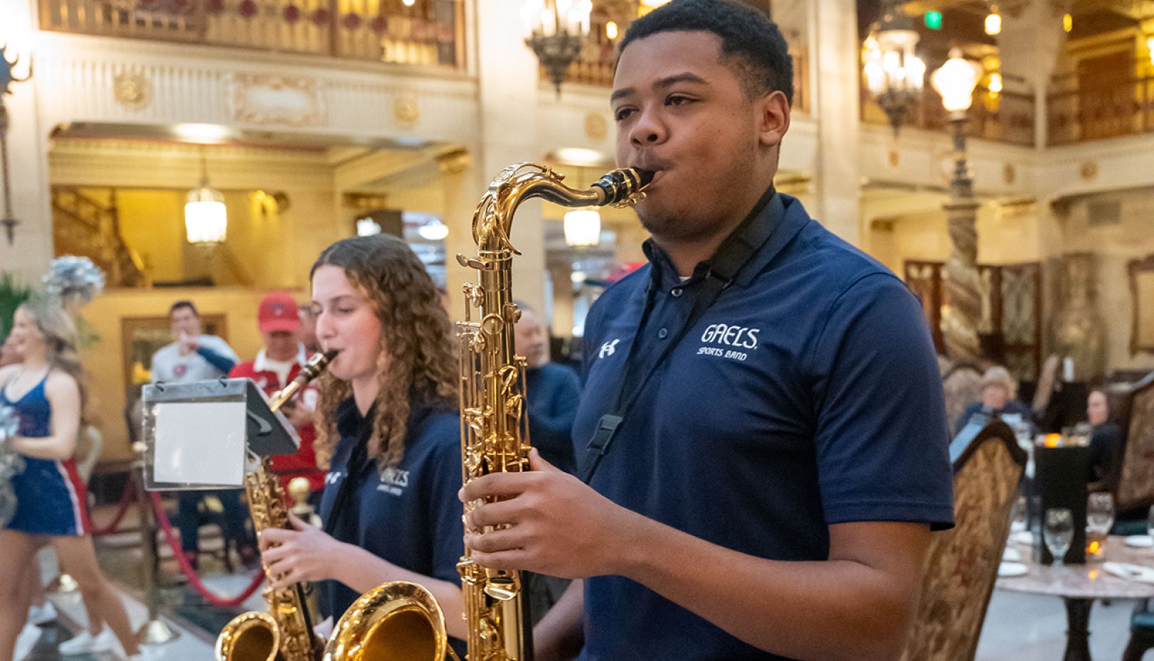 SMC Sports Band members play sax at 2024 NCAA Tournament Pregame Party