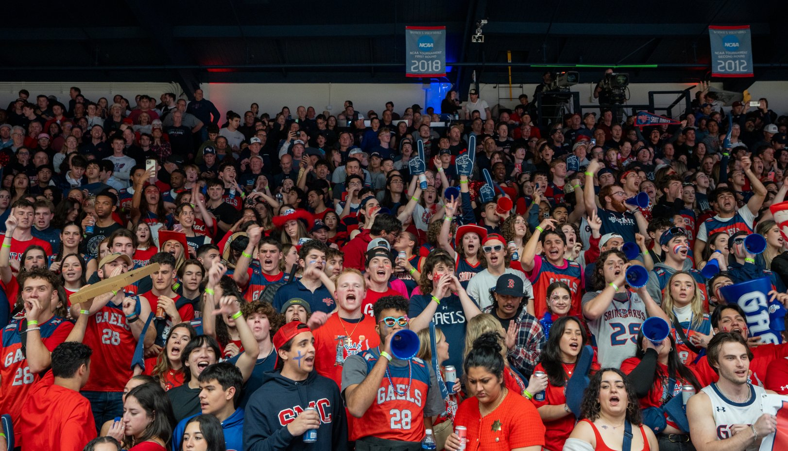 Students cheering at men's basketball game vs. Gonzaga 2024