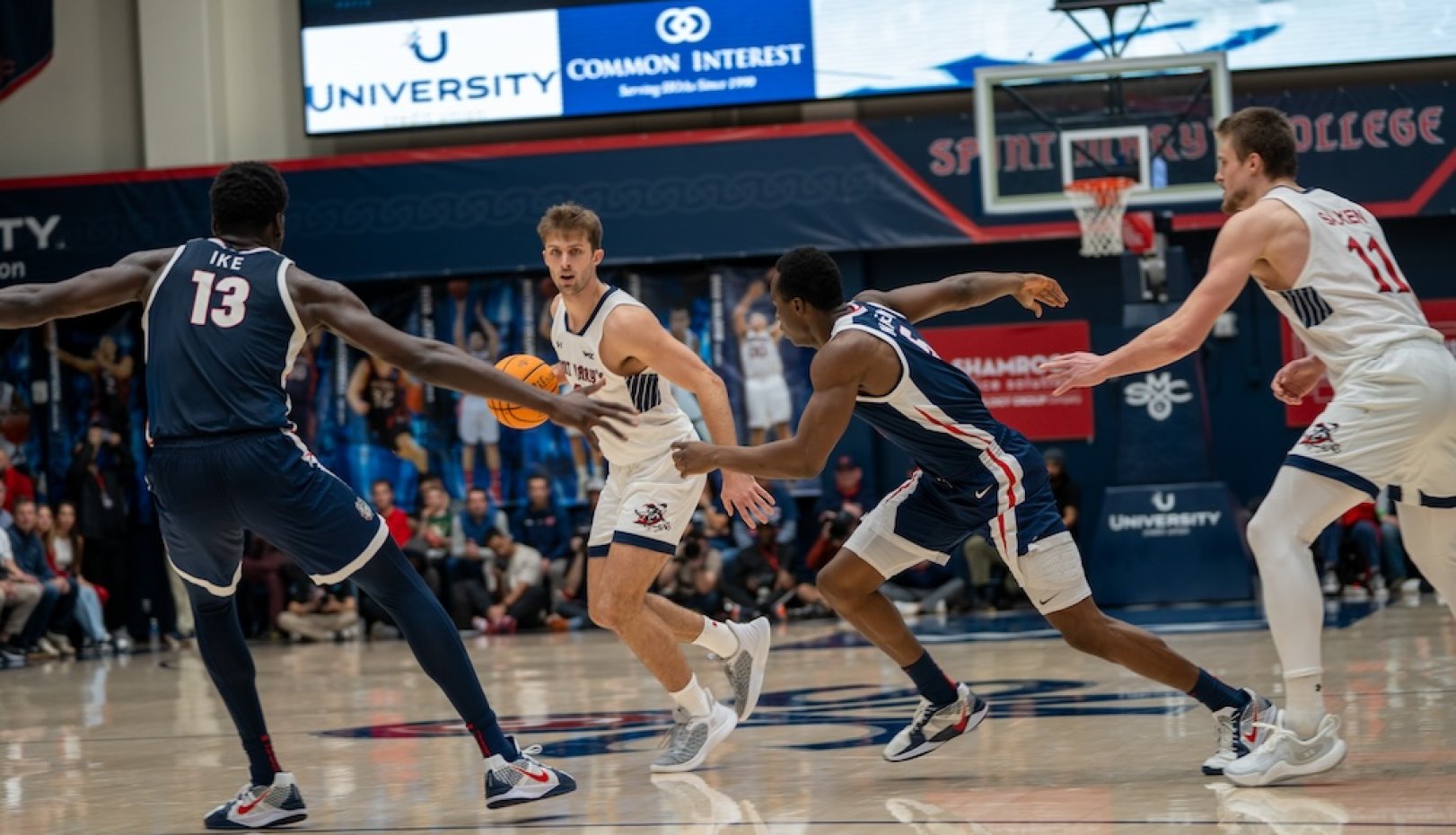 Men's basketball Augustas Marciulionis drives against Gonzaga
