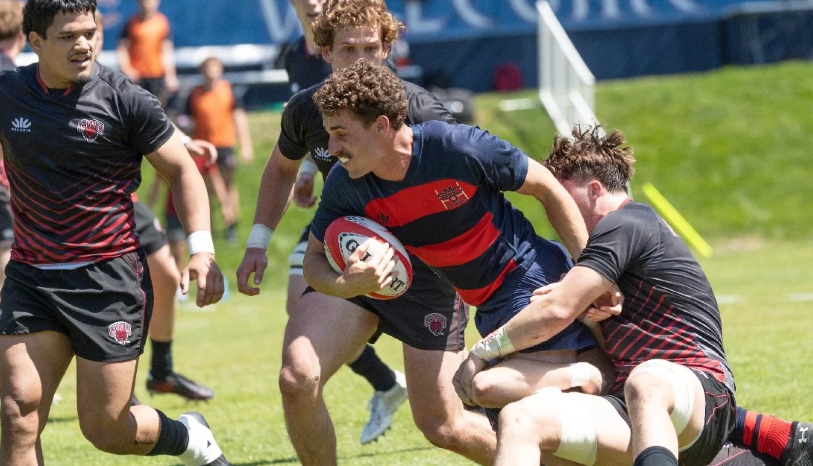 Men's Ruby player Mario Storti '25 runs vs. Central Washington