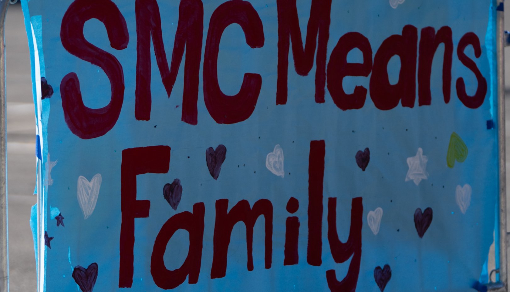 SMC Means family sign