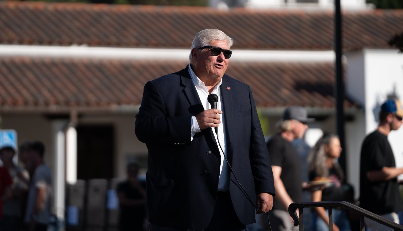 President Roger Thompson with microphone