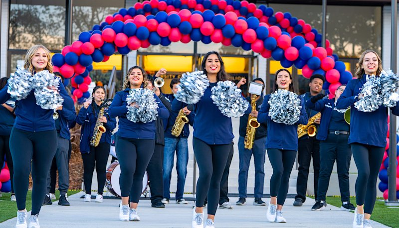 Spirit Team members cheer