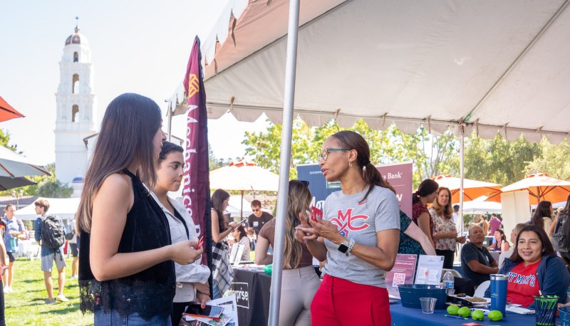 Students attending a stand at the Career Fair