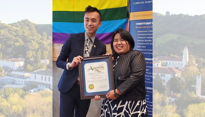 Justher Gutierrez is presented an award by