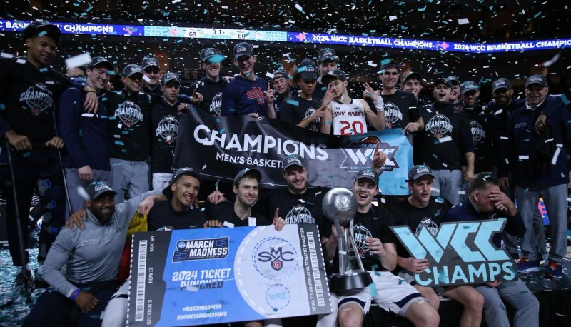 Men's Basketball Team with WCC trophy