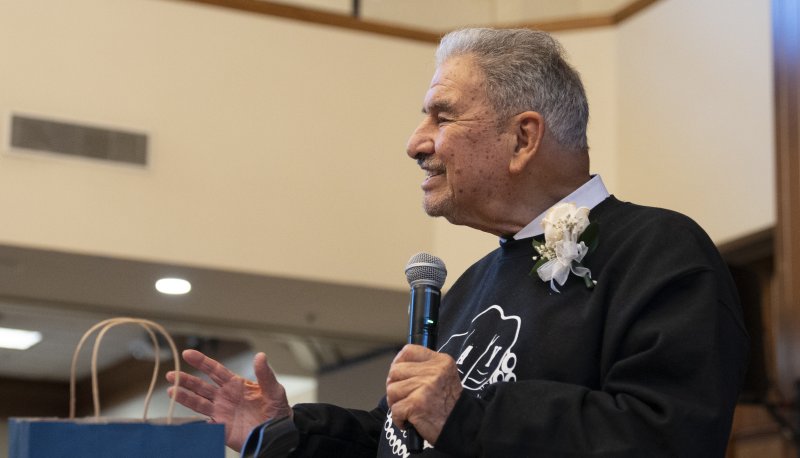 Brother Camillus Chavez speaking at his farewell event in 2022