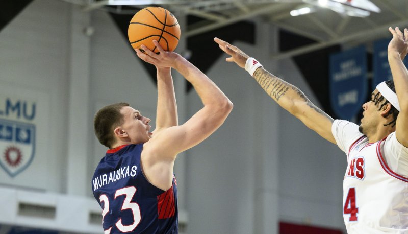 Men's Basketball player Paulius Murauskas shoots against LMU on February 27, 2025