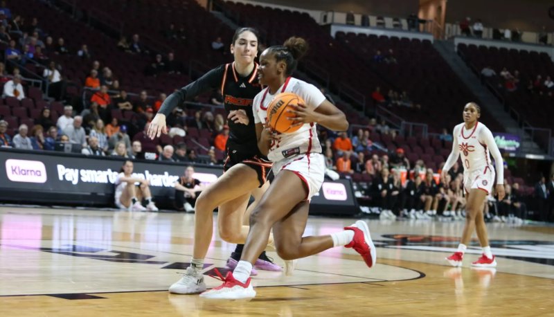 Women's basketball player Kennedy Johnson drives against Pacific in 2024-25 season