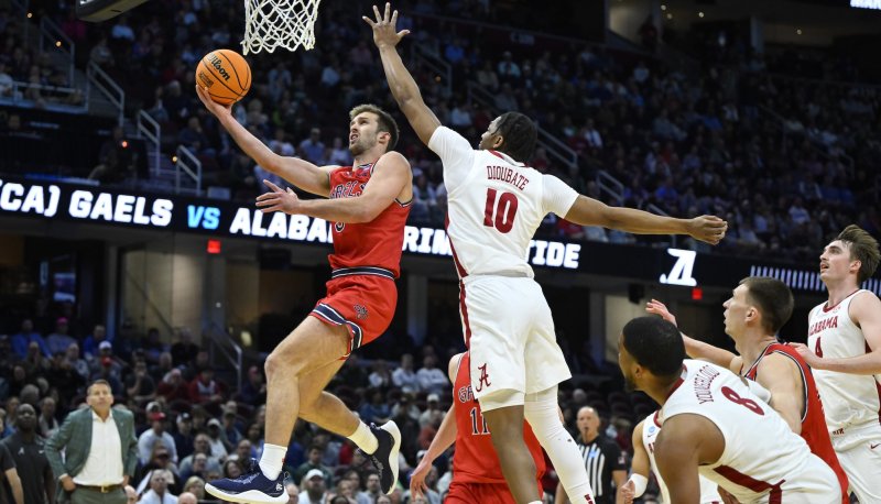 Men's basketball player Augustas Marciulionis shoots against Alabama in the NCAA Tournament in March 2025