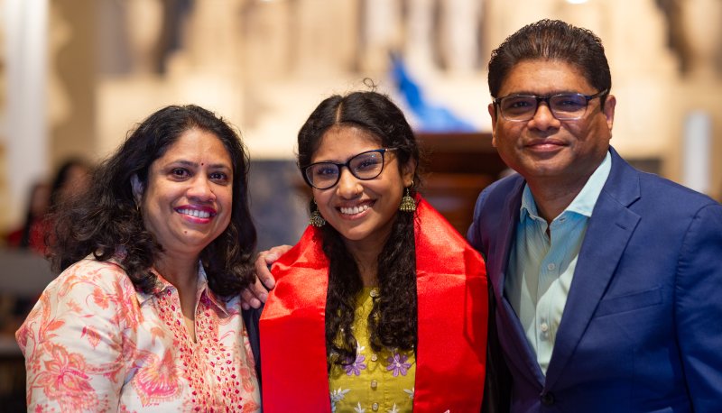 Students and parents posing at Asian Pacific Islander Graduate Celebration