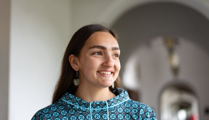 Amaya Simoni-Walters '25 in the hallways of Saint Mary's