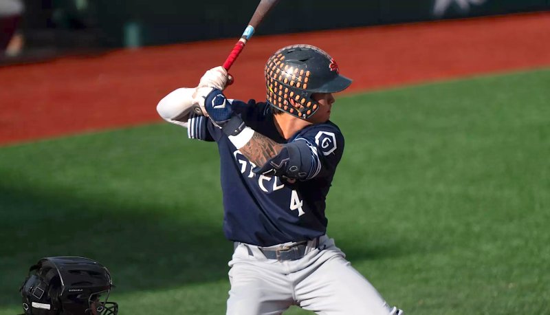 Baseball player Cody Kashimoto at the plate against USC in NCAA Regionals May 2025