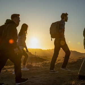 Students walk up mountain