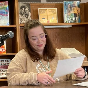 MFA student in Poetry Natalie Davis reading at Pause for Poetry.