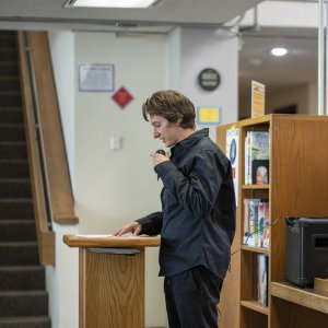 Former MFA student in Poetry, Nick Minges, reading at Pause for Poetry.