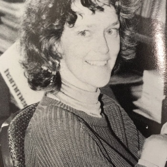 Headshot photo of Prof. Sandra Grayson at her desk