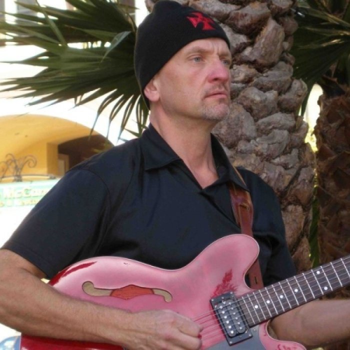 Jeff Massanari playing the guitar
