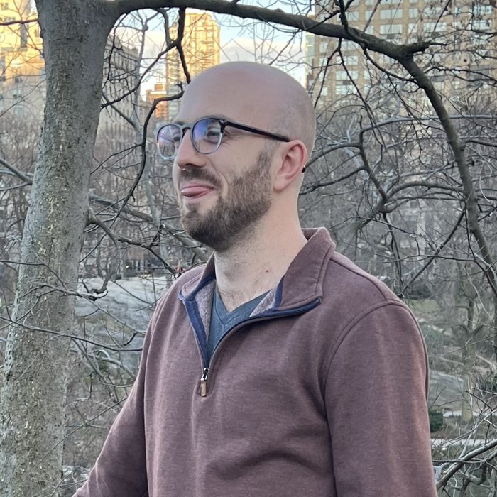 Mitchell White at Central Park, staring off into the distance