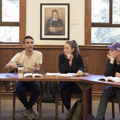 Students discussing a topic in a seminar class