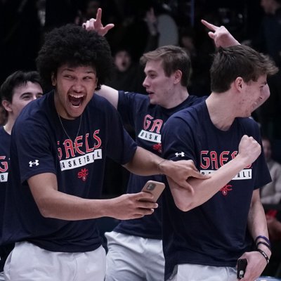 Men's basketball players celebrate on March 12 2023 as NCAA brackets are announced