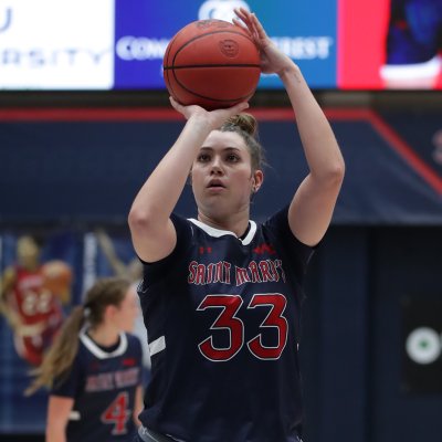 Women's basketball player Ali Bamberger shoots against Santa Barbara