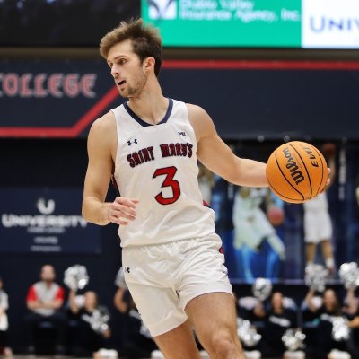 Augustus Marciulionis driving to basket