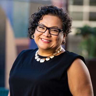 Angélica Garcia with SMC campus in background for May 2023 story