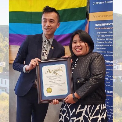 Justher Gutierrez is presented an award by