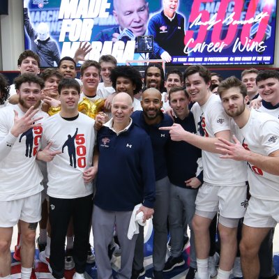 Men's Basketball Coach Randy Bennett and players celebrate 500 wins in February 2023