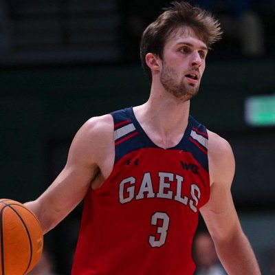 Men's Basketball Player Augustus Marciulionis drives against USF in January 2024