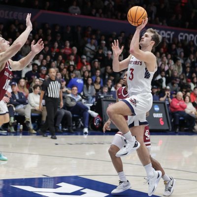 Men's basketball player Augustus Marciulionis shoots against Santa Clara in January 2024