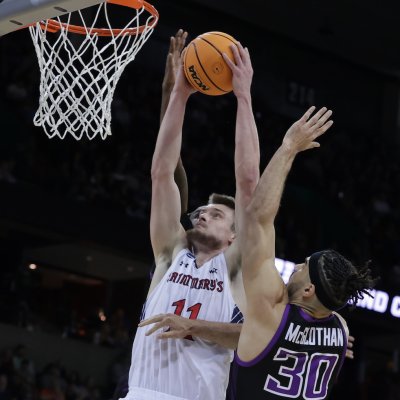 Men's basketball player Mitchell Saxen shoots against Grand Canyon in NCAA Tournament March 2024