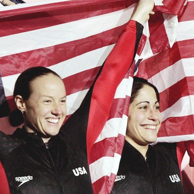 Shauna Rohbock and Valerie Fleming celebrating their medal
