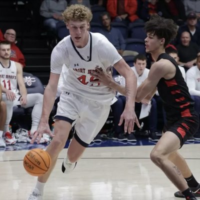 Men's Basketball player Andrew McKeever drives against Stanislaus State in his debut game on November 20, 2024