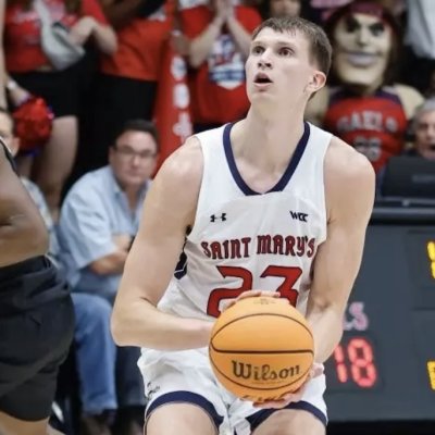 Men's Basketball Player Paulius Murauskas shoots against Towson State in November 2024