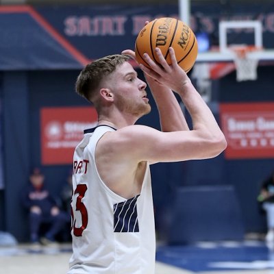 Men's basketball player Luke Barrett shoots against Cal Poly in November 2024