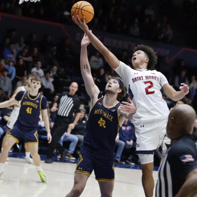 SMC's Jordan Ross driving down the court