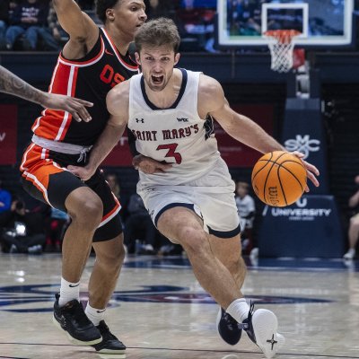 Men's Basketball Player Augustas Marciulionis drives against Oregon State in final game of 2025 season