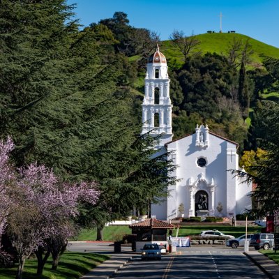 SMC Chapel and fruit trees in bloom in springtime